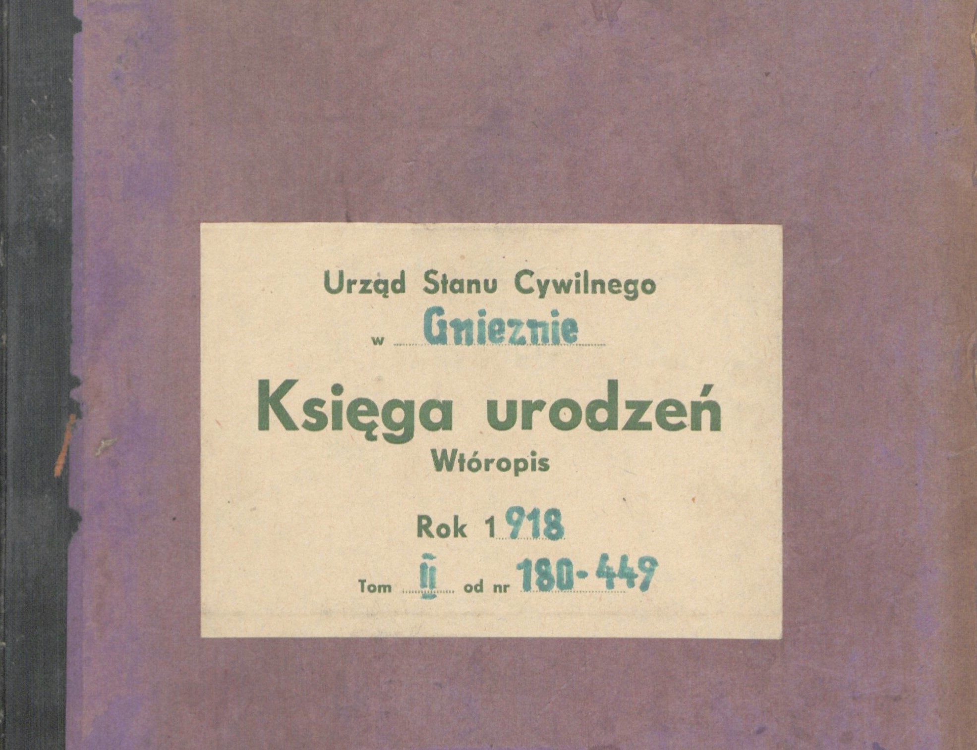 Okładka księgi w kolorze fioletowym z zadrukowaną nalepką papierową.